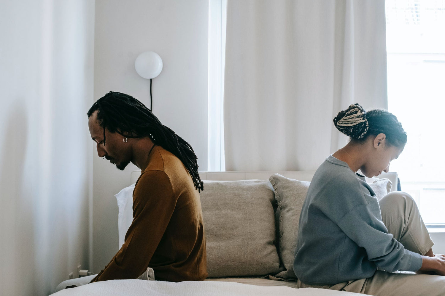 Black Couple Fighting in Bed