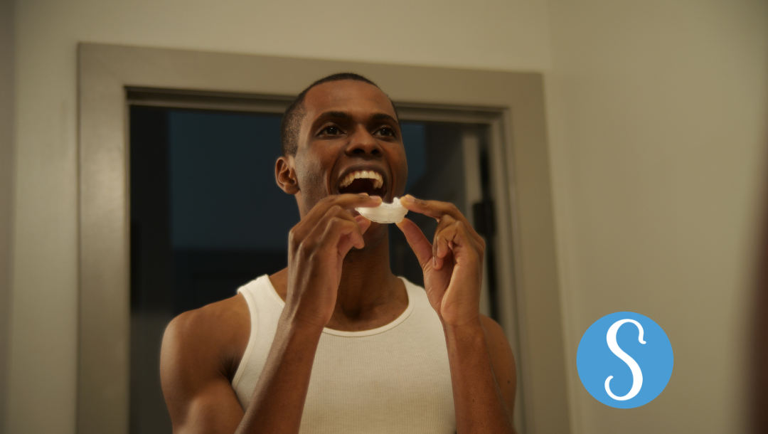 Man using a Somnofit-S mandibular advancement device