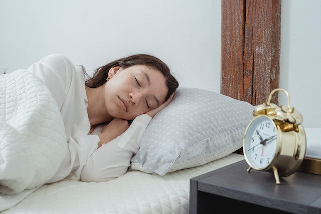 woman sleeping peacefully on right side